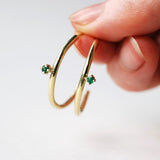 Large emerald hoops